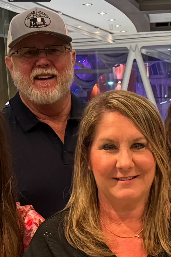 A man and a woman are standing next to each other
